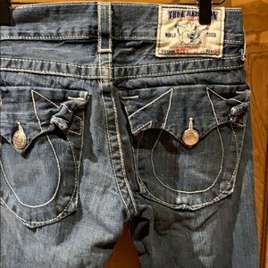 True Religion Men’s “Ricky” Bootcut Jeans.